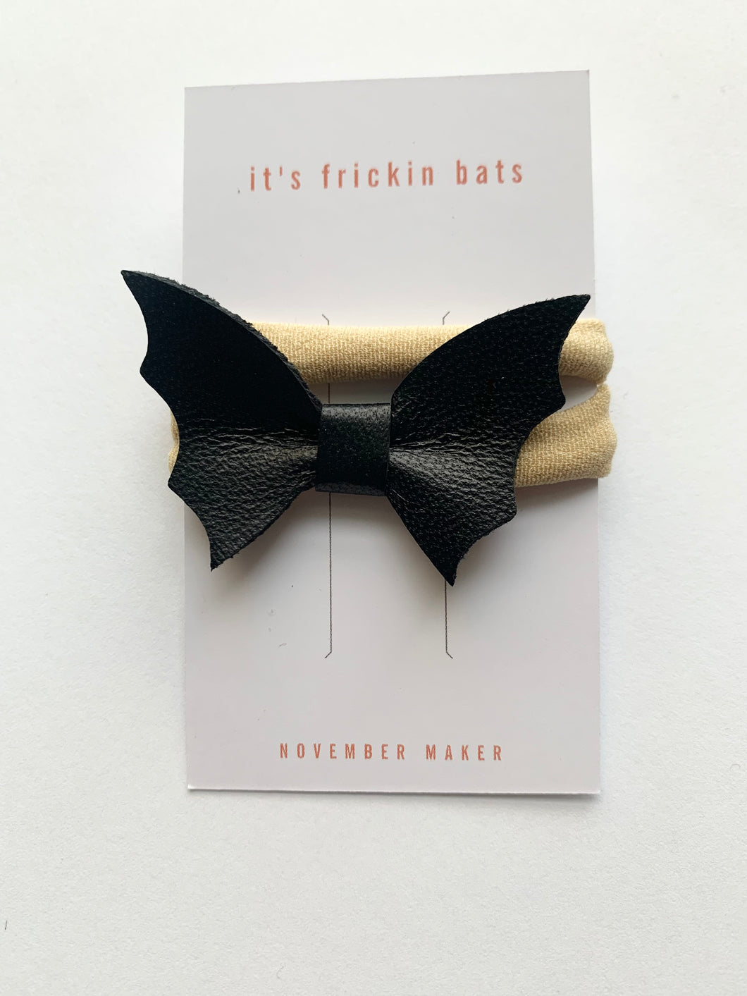 newborn black bat bow